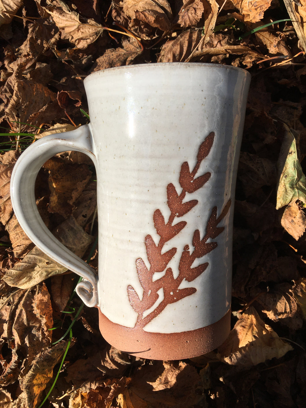 Tall red clay fern mug